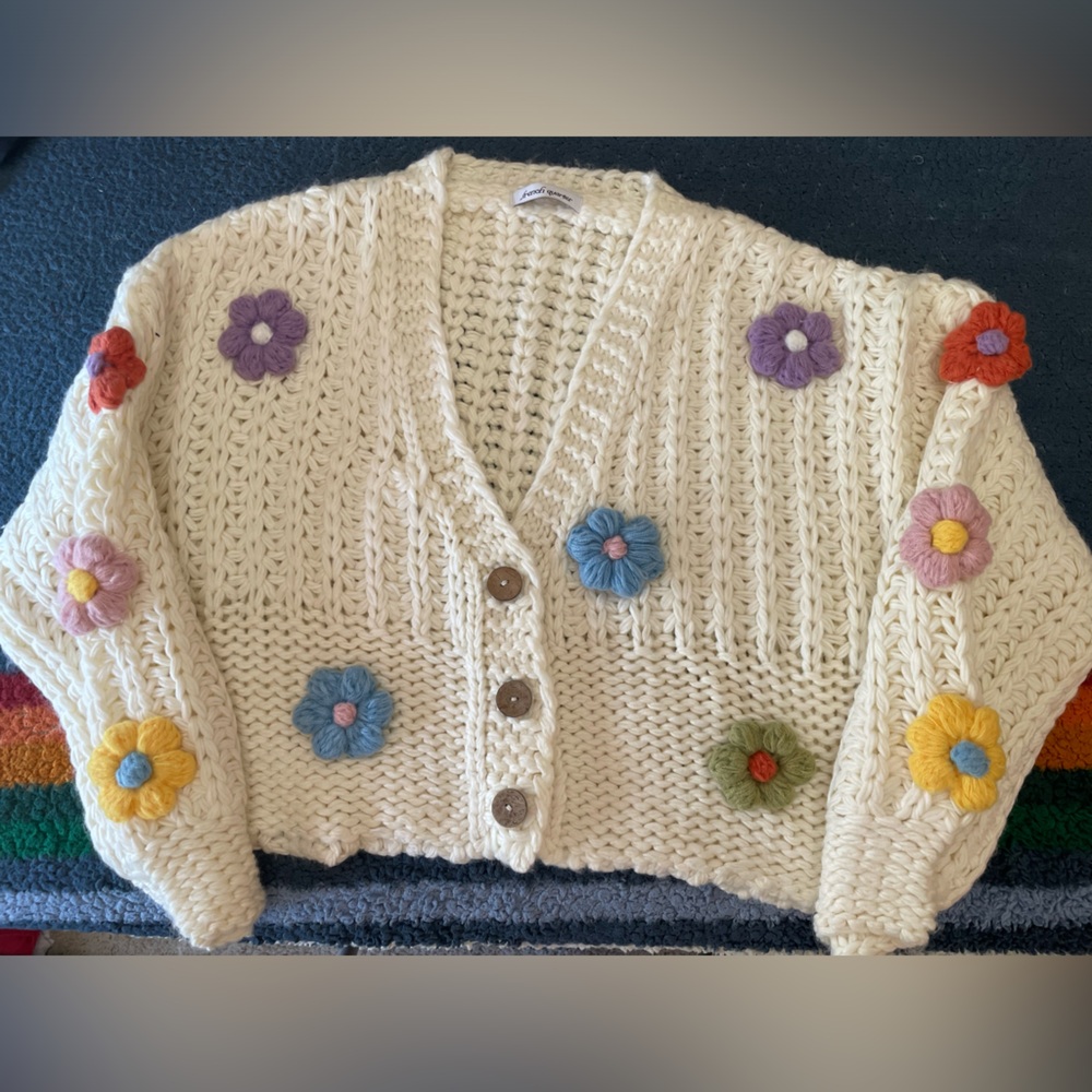 This is a beautiful, never worn, French Quarter Cardigan!
